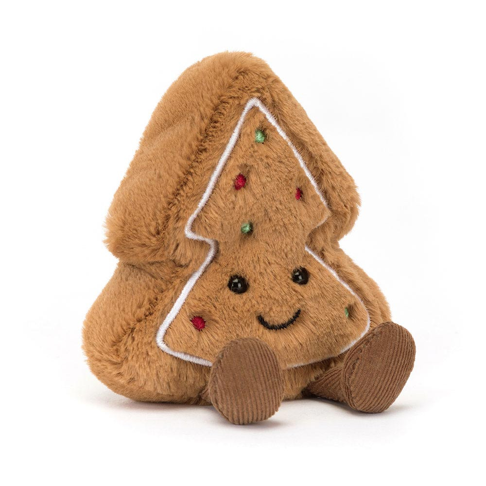 peluche cookie en forme de sapin de face avec un visage qui sourit et avec des petites perle vertes et rouges