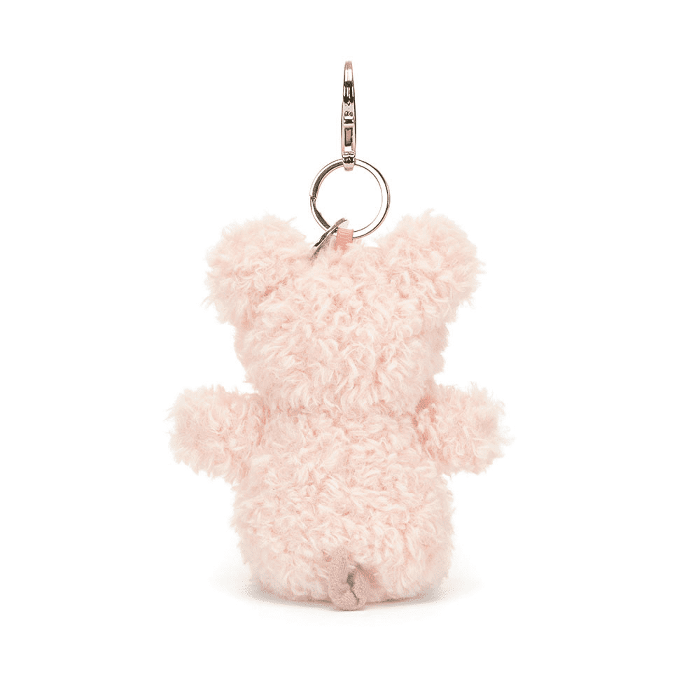 petit cochon à accrocher à un sac de dos sur fond blanc